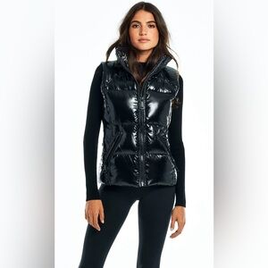 SAM. Freedom Cropped Vest
Color: JET
Size: Large
Quantity: 1
Price: $350.00